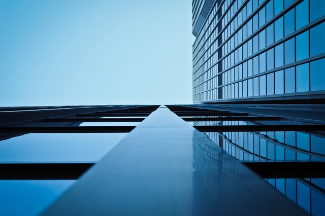 low angle view of office building against clear sky